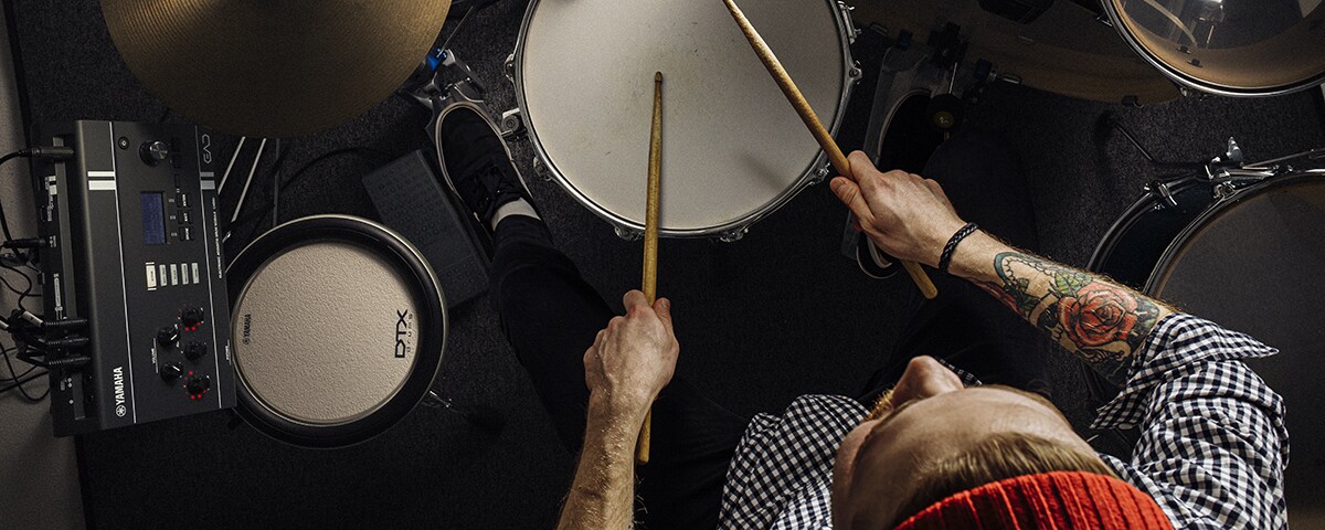 Drummer using Yamaha EAD20 during performance for real-time sound control and personal monitoring.