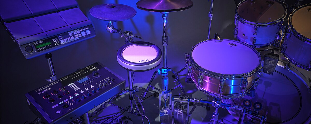 Photo of a hybrid drum setup combining acoustic and electronic drums
